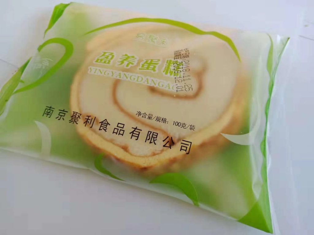 绿色营养蛋糕包装表表的竖向玄色字符象征